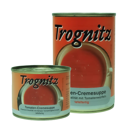 Trognitz Tomatencremesuppe - 1 kleine und 1 große Konservendose mit rotem Etikett und Suppe als Motiv.
