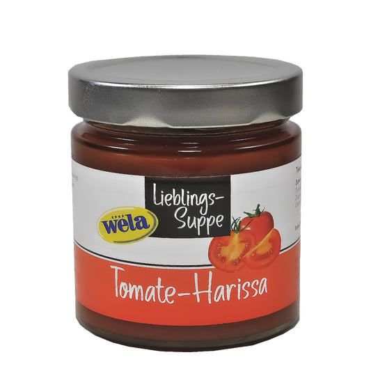 Wela Tomate-Harissa-Lieblingssuppe - Glas mit silbernen Schraubverschluss und weiß-rotem Etikett mit Tomatenabbildung. 
